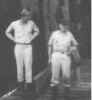 shipfronthatchopen2men.jpg (63556 bytes)